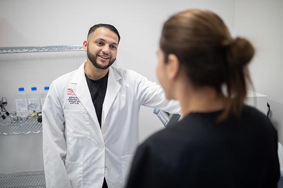 Two physicians conversing